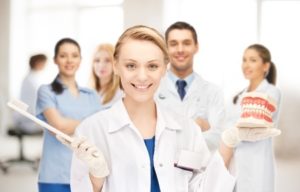 picture of attractive female doctor with toothbrush